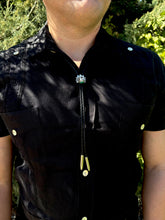 Load image into Gallery viewer, Quetzalcoatl Bolo Tie Sterling Silver and Black Leather