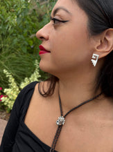 Load image into Gallery viewer, Quetzalcoatl Bolo Tie Sterling Silver and Mocha Leather
