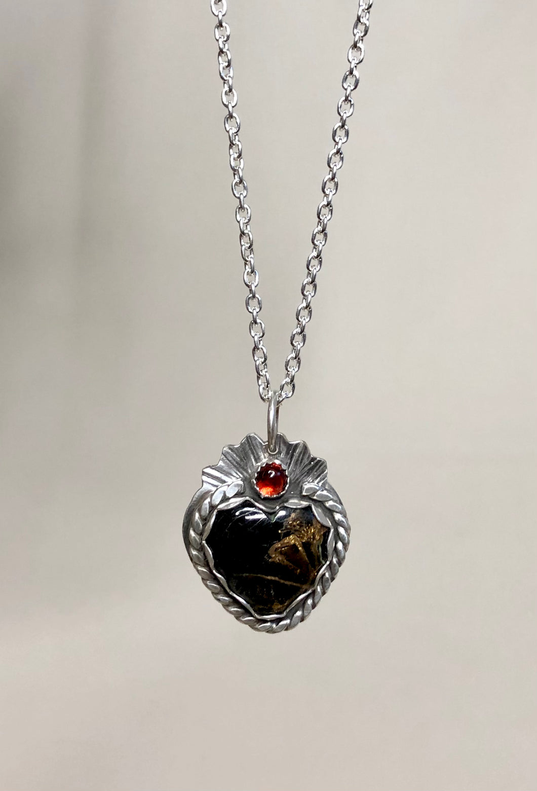 Black and Gold Mohave Turquoise and Garnet Heart Silver Necklace