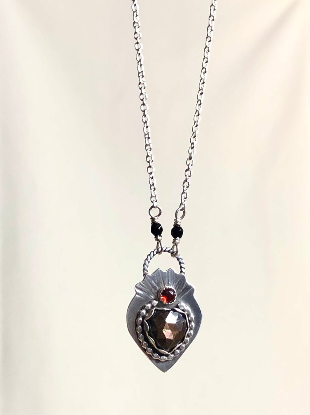 Black Star Sapphire and Garnet Heart Silver Necklace
